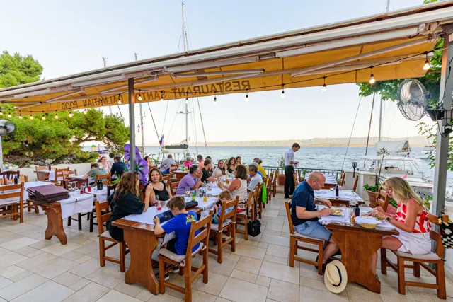 Guests dining on the Santo terrace